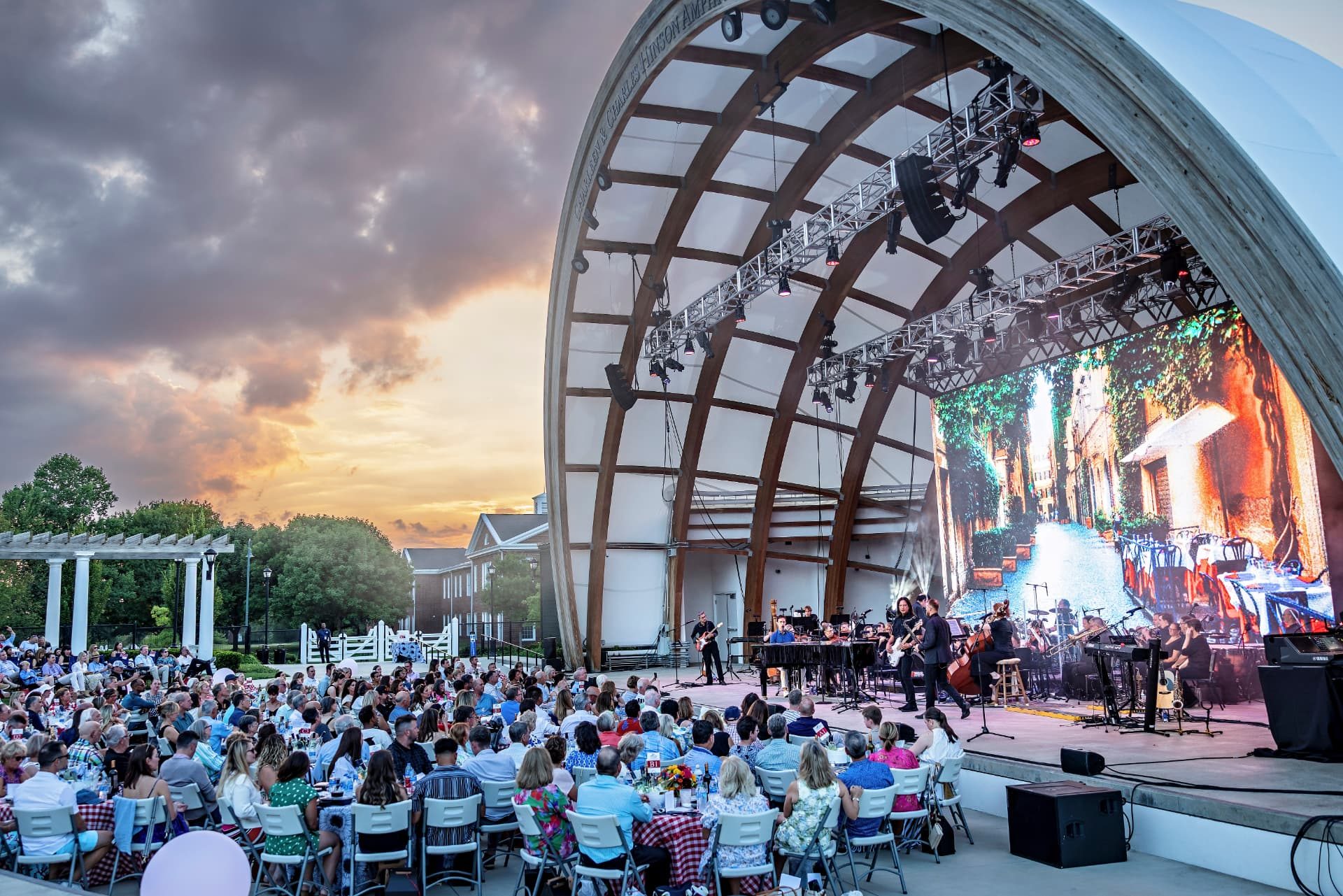 Community members gathered for a live arts performance at the amphitheater in New Albany, Ohio.